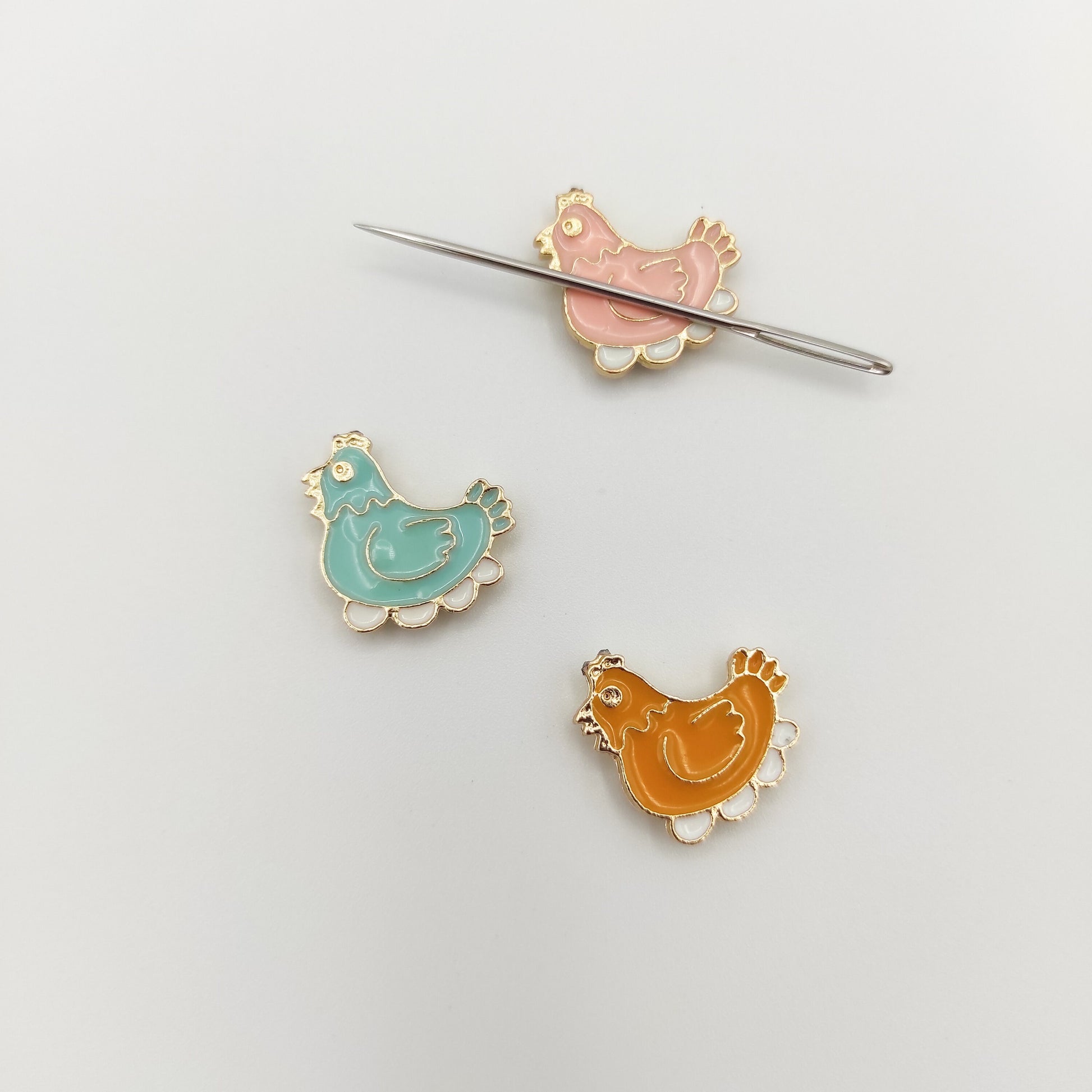 Hen lays eggs enamel needle minders, Needle Minder for Embroidery, Cross Stitch, Needle work, needlecraft projects and sewing.